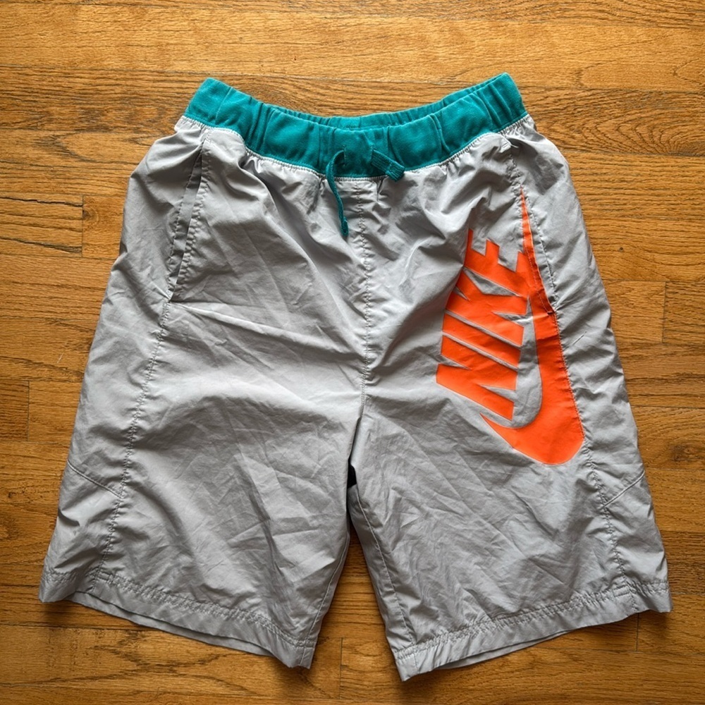 Nike boys gray teal standard fit shorts with orange logo size XL